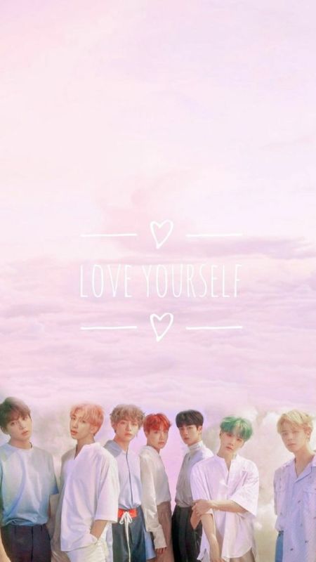 Hình nền nhóm nhạc dưới bầu trời hồng, chữ "Love Yourself", độ phân giải 800x450, chất lượng HD, phong cách tươi sáng.