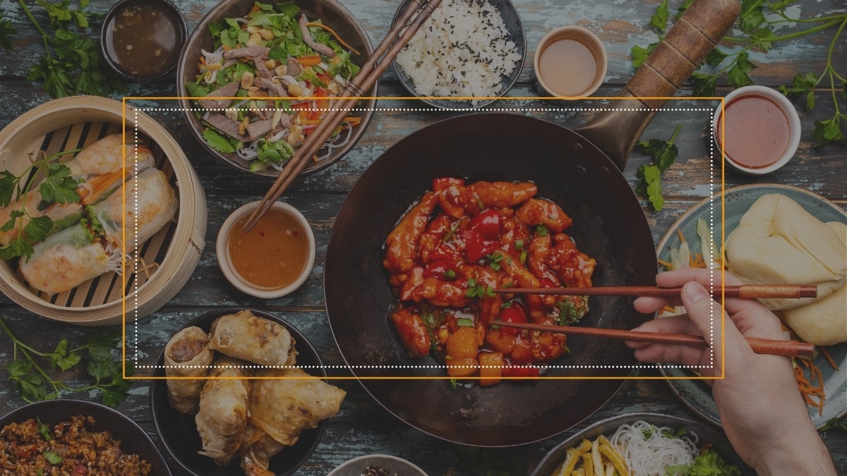 Vietnamese cuisine on rustic table, featuring diverse dishes. HD quality, 1080x1920. Keywords: Vietnamese food, culinary.