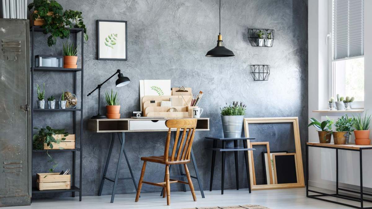Góc làm việc sáng tạo với cây xanh trong phòng hiện đại, độ phân giải 1080x1920, hình ảnh chất lượng HD.